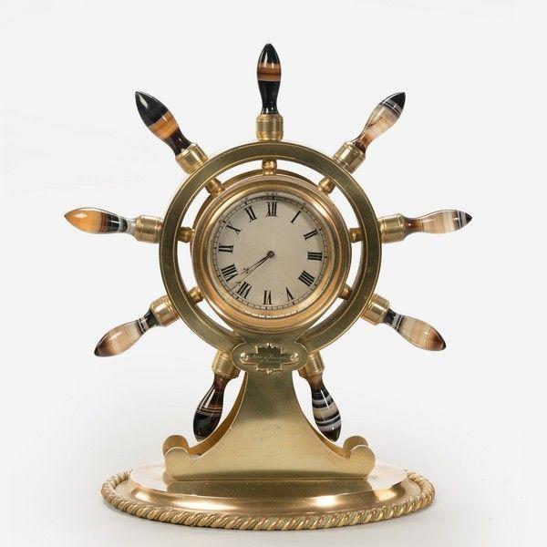 English gilt metal clock in the form of a ship’s wheel