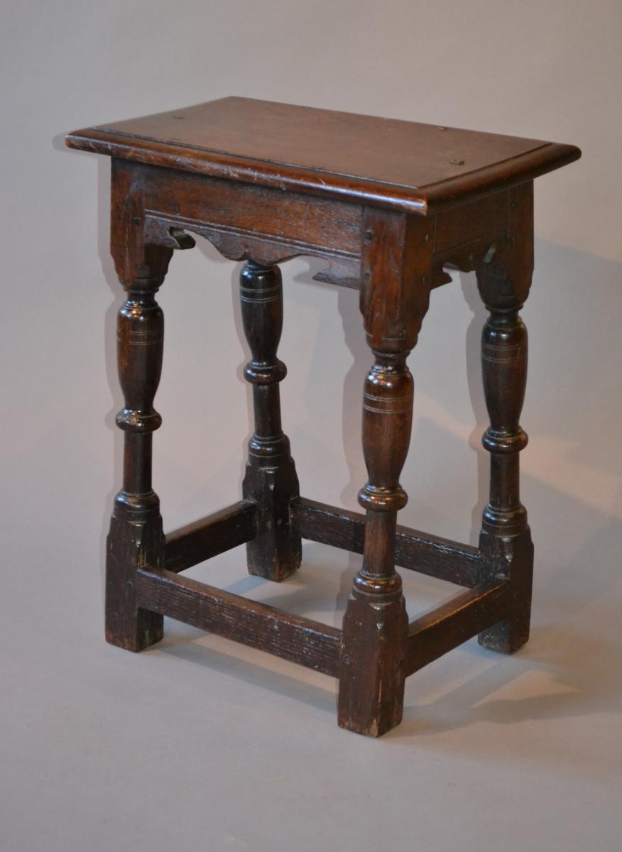 An elegant mid 17th century oak joint stool