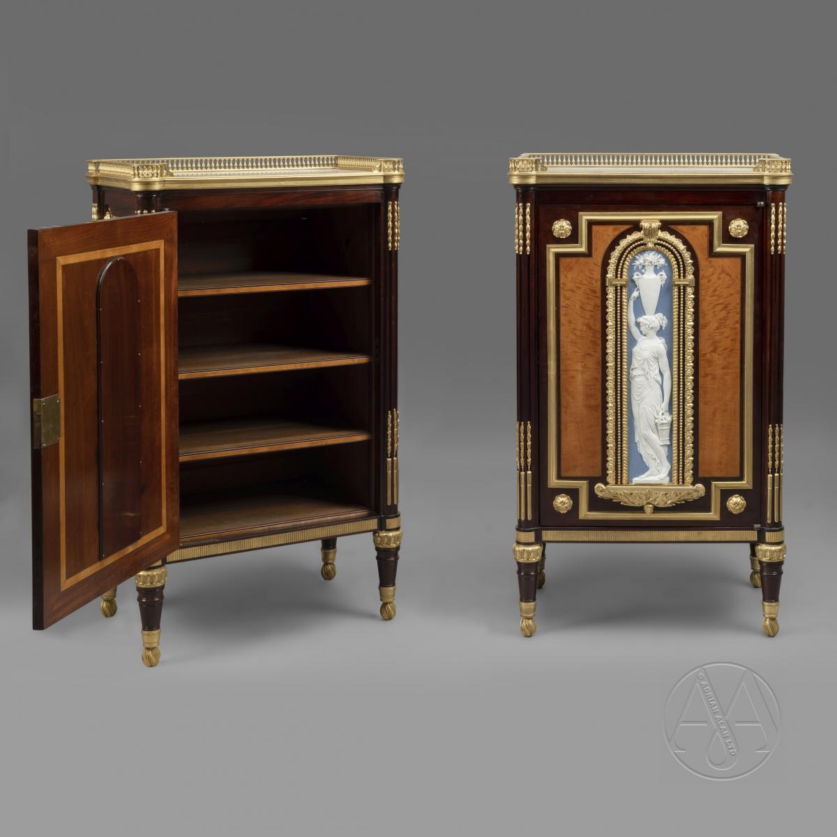 A Rare and Highly Important Pair of Neoclassical Style Gilt-Bronze and  Biscuit Porcelain Mounted Mahogany Side Cabinets by Jules Piret