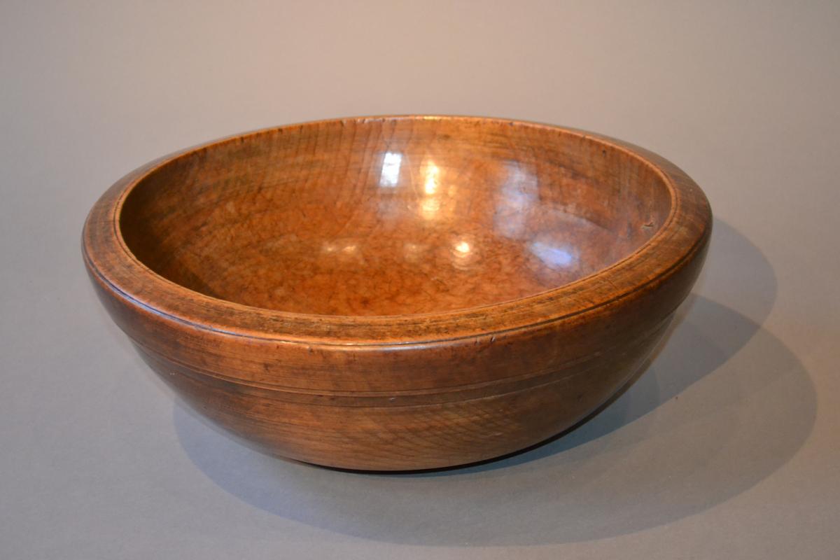 A large Georgian sycamore dairy bowl