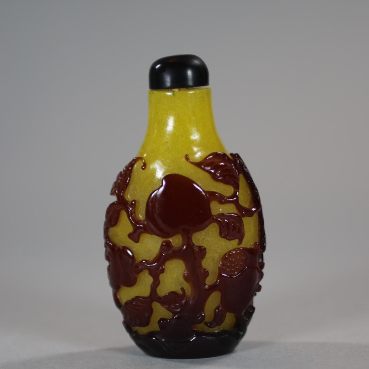 Rare Chinese red-overlay yellow glass snuff bottle, Qing dynasty, 19th Century