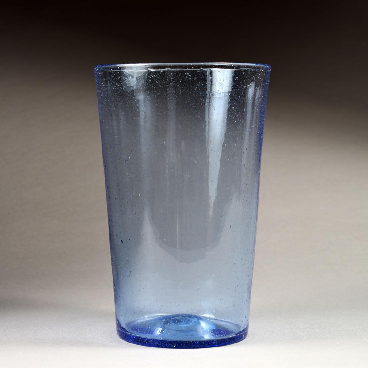 A mid-century glass vase of a sapphire blue colour