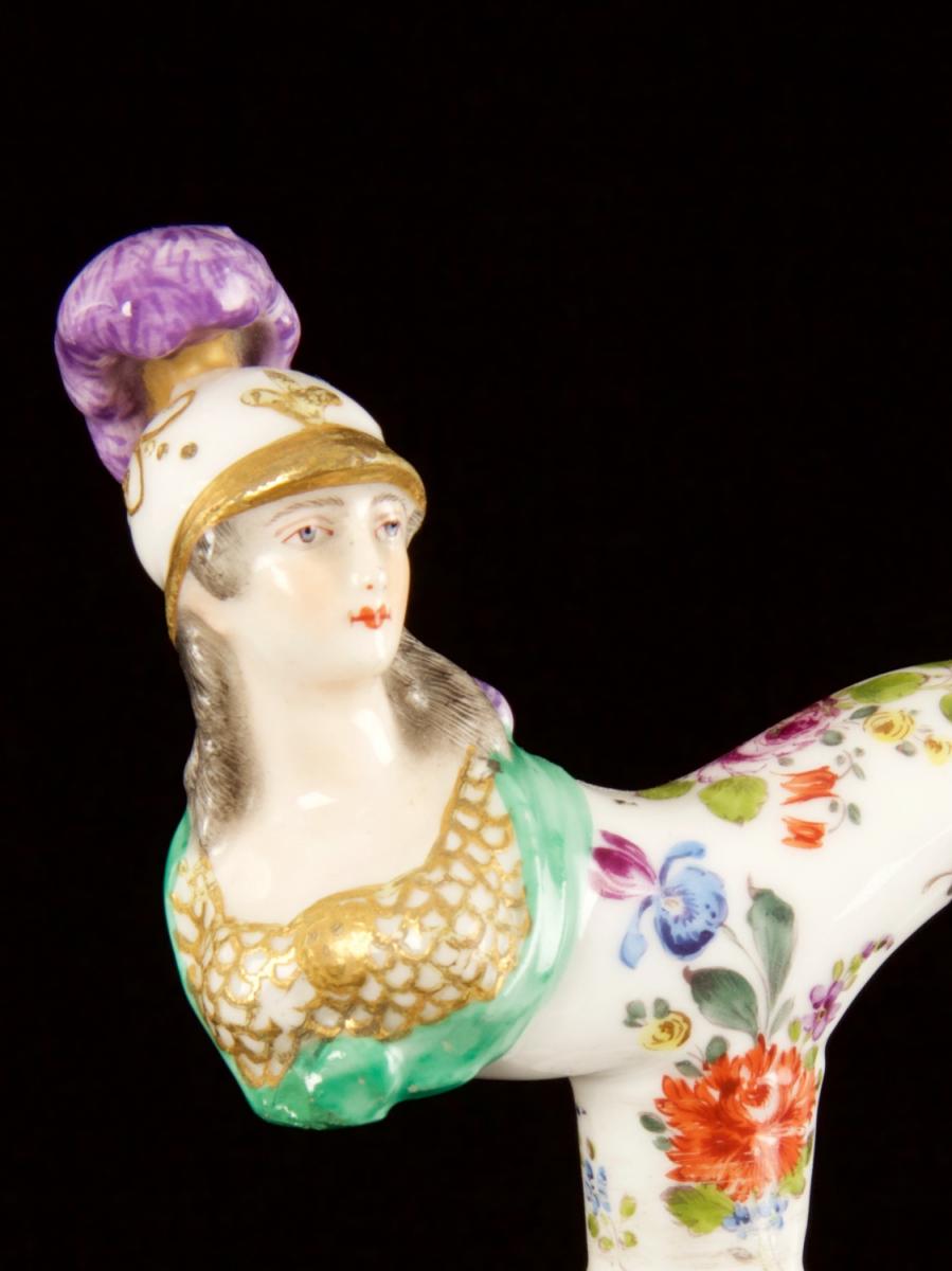 A fine Tau-shaped porcelain handle modelled as Minerva_b