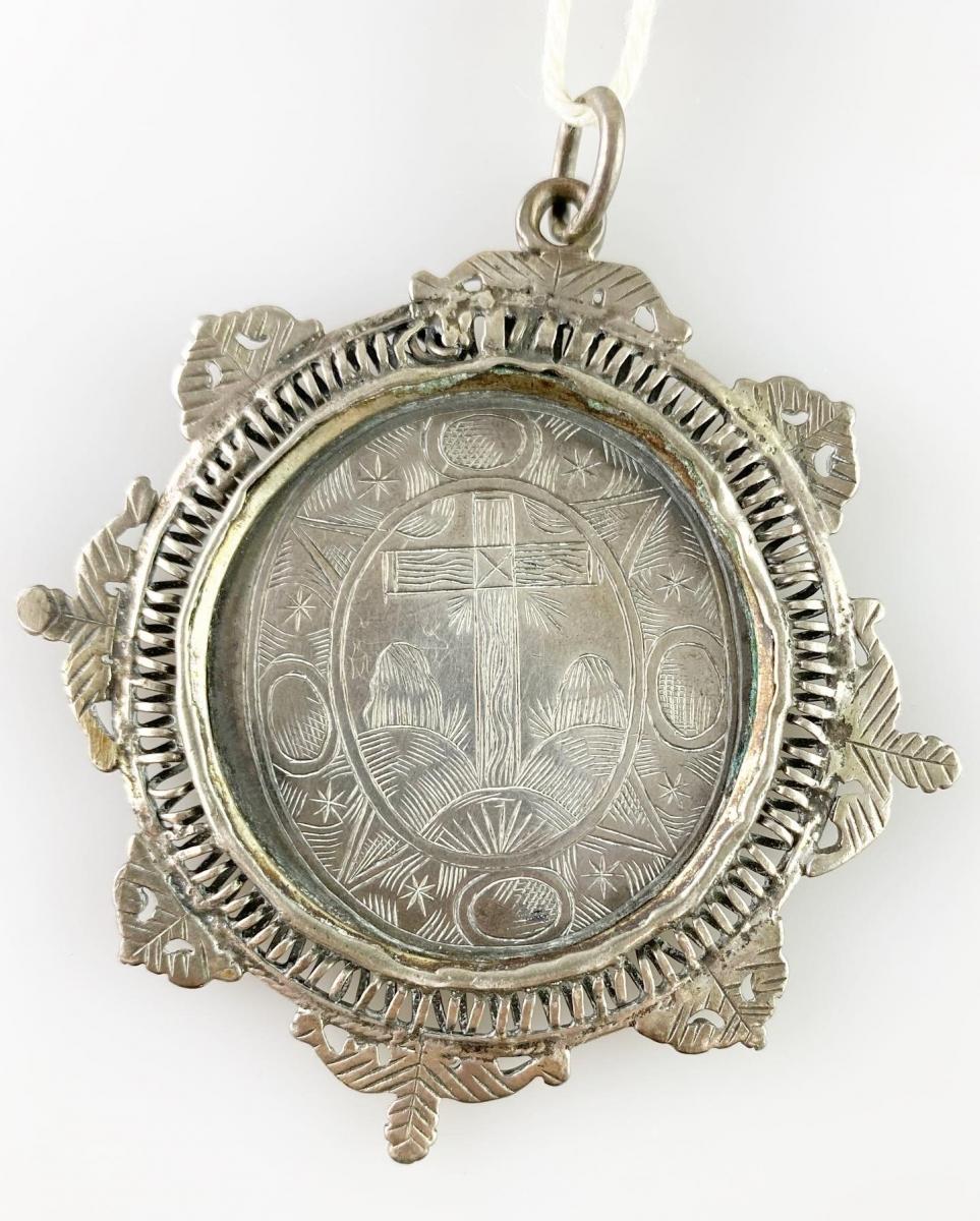 Silver devotional pendant. Spanish, late 17th century