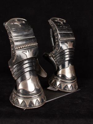 An exceptional pair of black and white mitten gauntlets_e