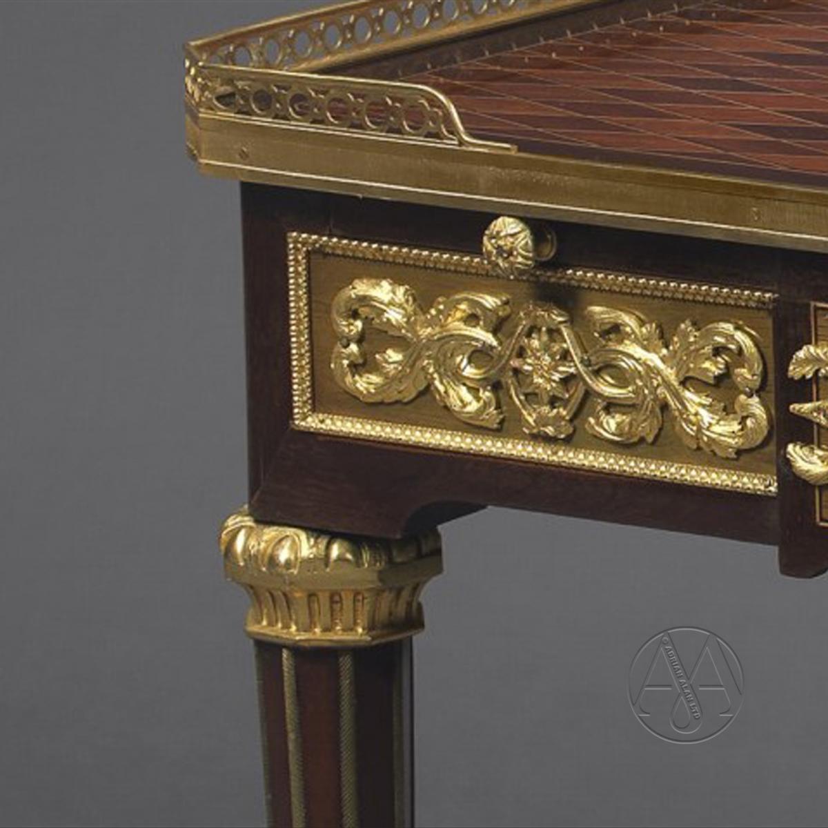 A Louis XVI Style Mahogany Centre Table by Paul Sormani