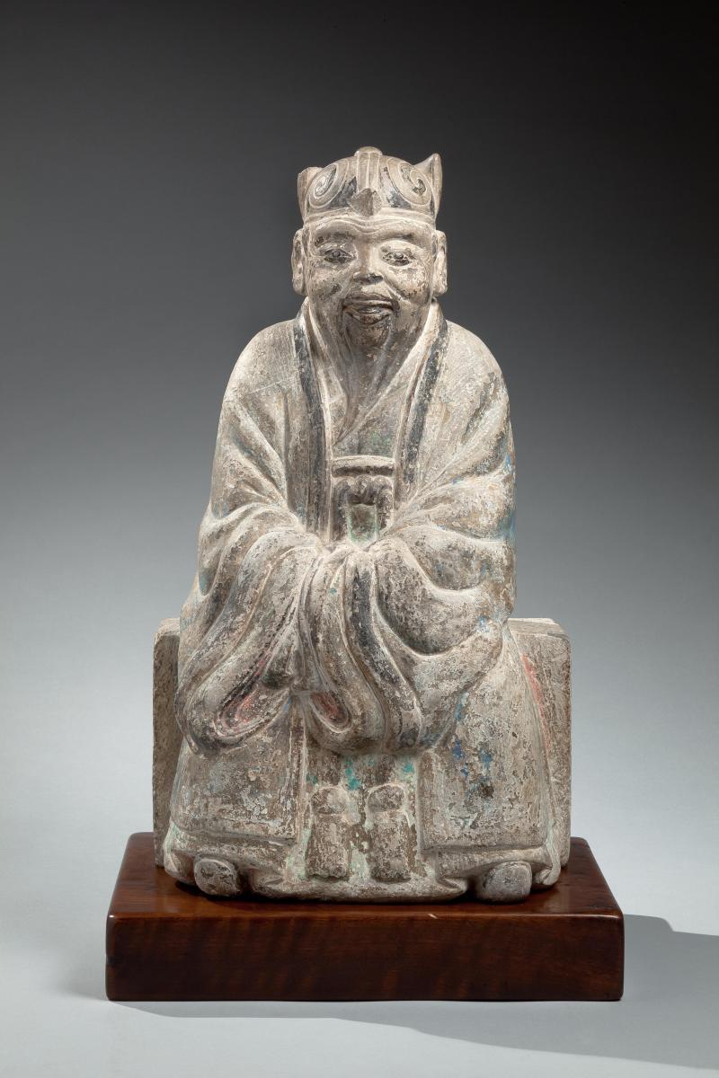 A carved grey stone figure of the deified Laozi, Chinese, Ming dynasty, probably 16th century.