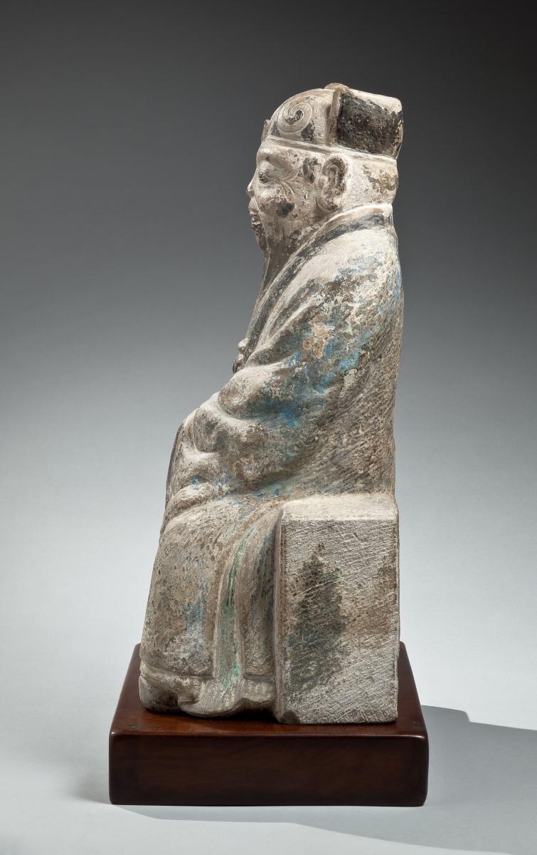 A carved grey stone figure of the deified Laozi, Chinese, Ming dynasty, probably 16th century.- side