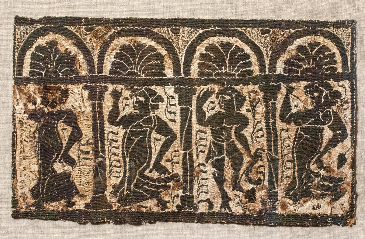 Coptic tunic fragment showing bacchanalia, Byzantine period, c.4th century AD