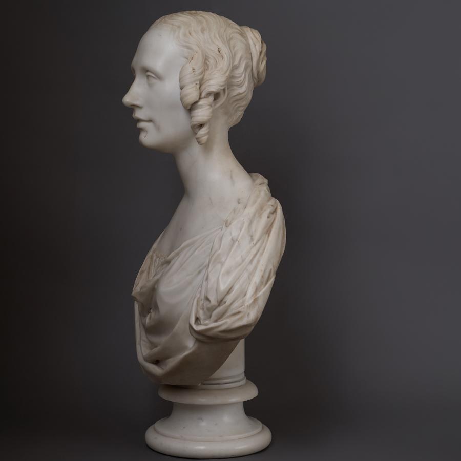 A 19th century Statuary marble portrait bust of a young woman by Patric Park (1811-1855) dated 1846