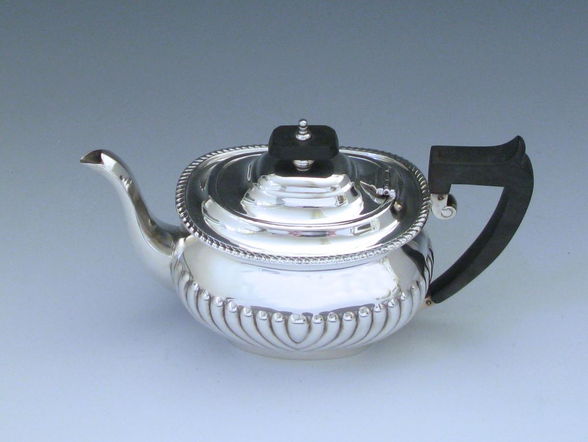 A Sterling Silver Edwardian Teapot by William & George Sissons made in ...