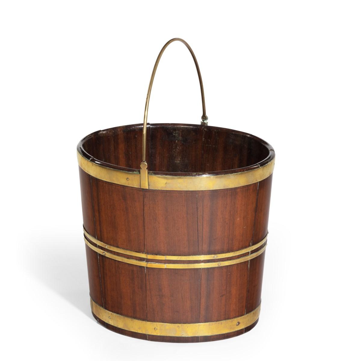A late George III brass bound bucket