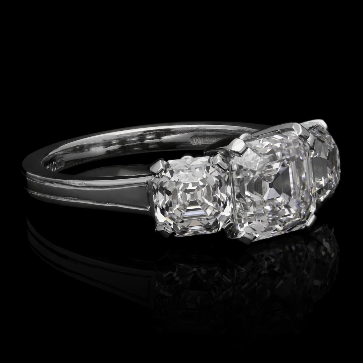 A beautiful three-stone Asscher cut diamond ring set in platinum with 3.80cts total