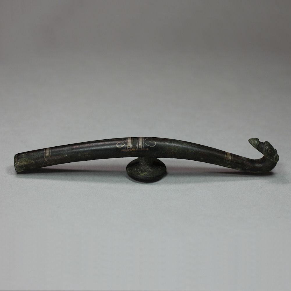 Silver inlaid bronze belt hook, Daigou, Warring States Period (480-222 BC)