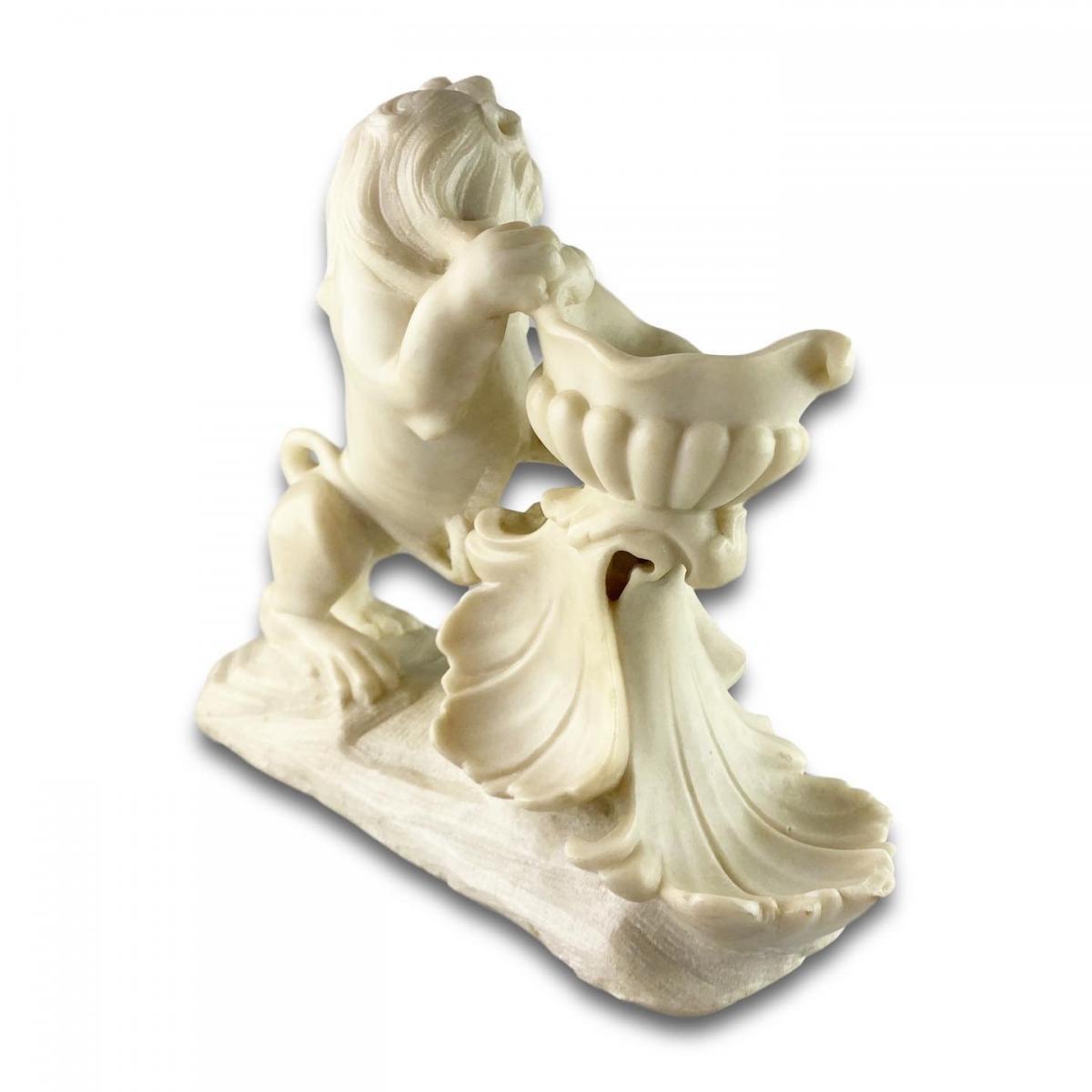 A large marble table salt of a lion. French, first half of the 19th century