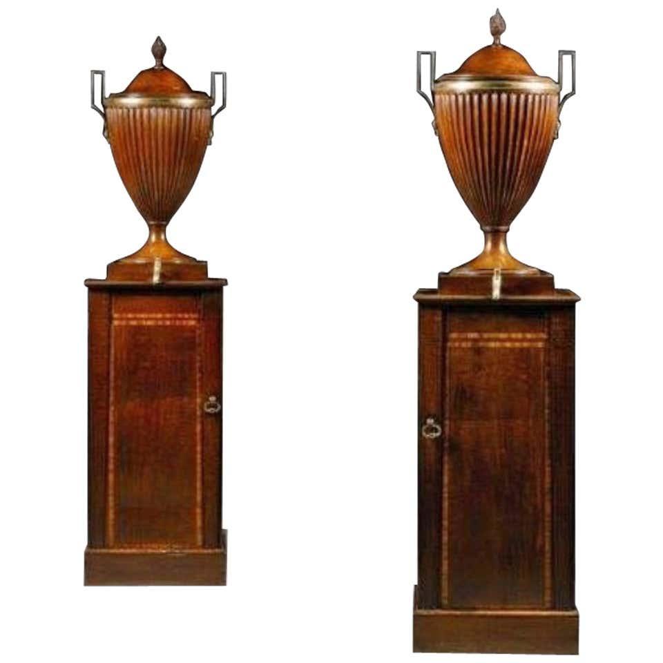 A fine pair of George III mahogany wine cisterns attributed to Gillows