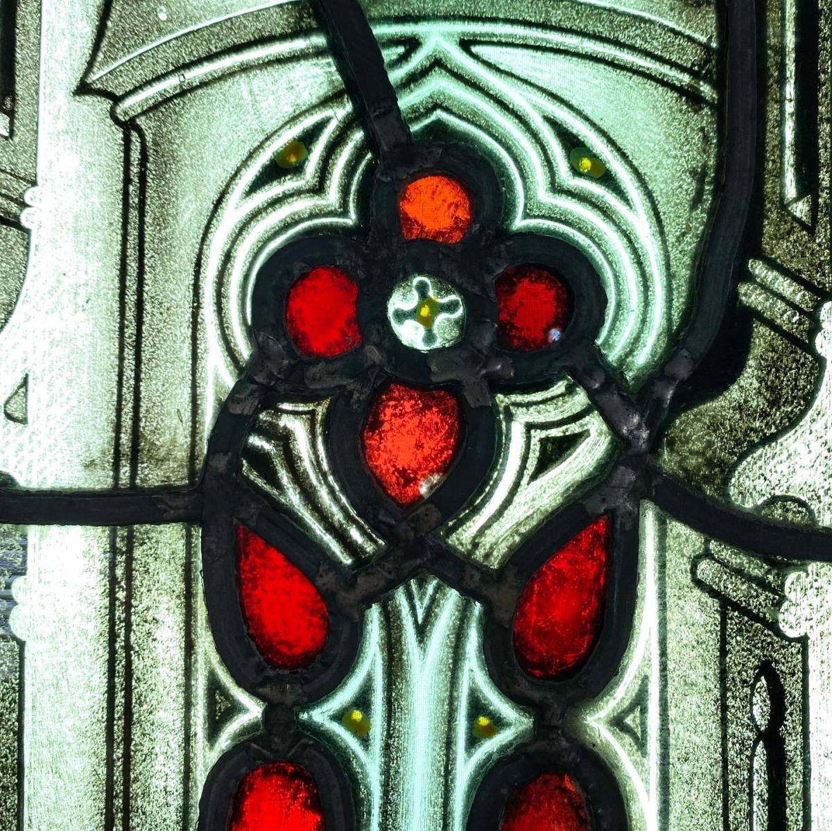 Stained glass panel of an elaborate gothic window. English, 19th century