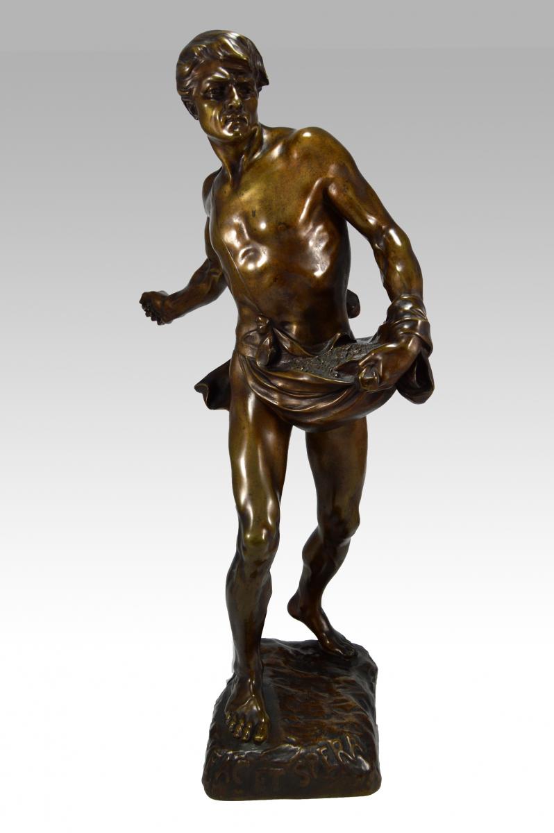 Bronze Sculpture of a man sowing seeds by Henri Desire Gauquie