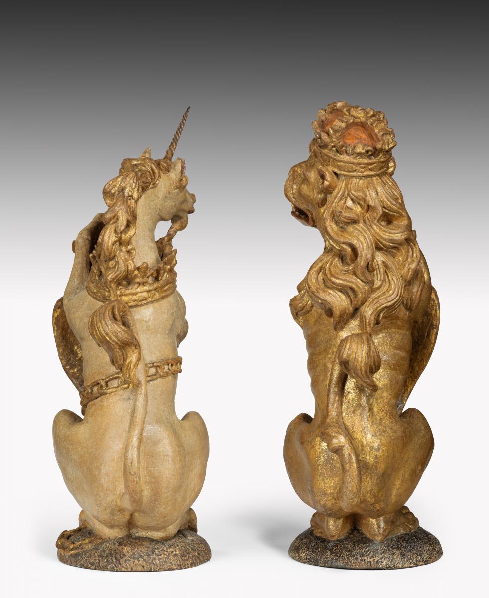  James I Carved Oak Polychrome-decorated and Parcel-gilt Heraldic Supporters in the form of a Lion and a Unicorn
