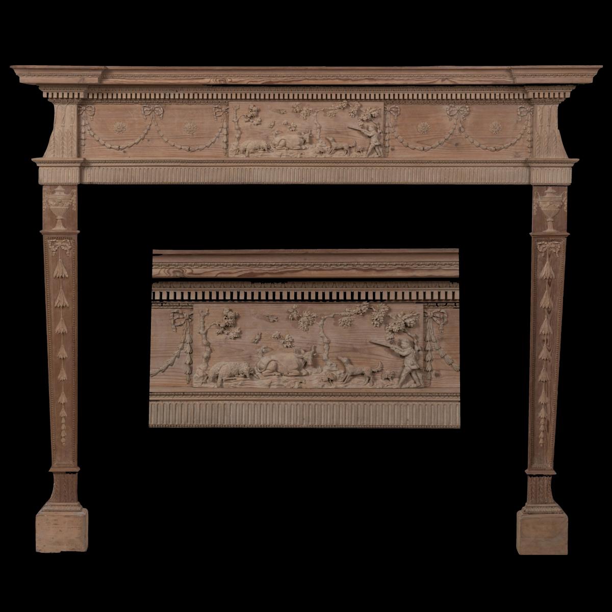 An 18th century English pine and limewood chimneypiece