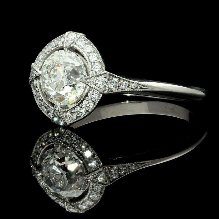 A beautiful 1.15ct old European cut diamond and platinum halo ring
