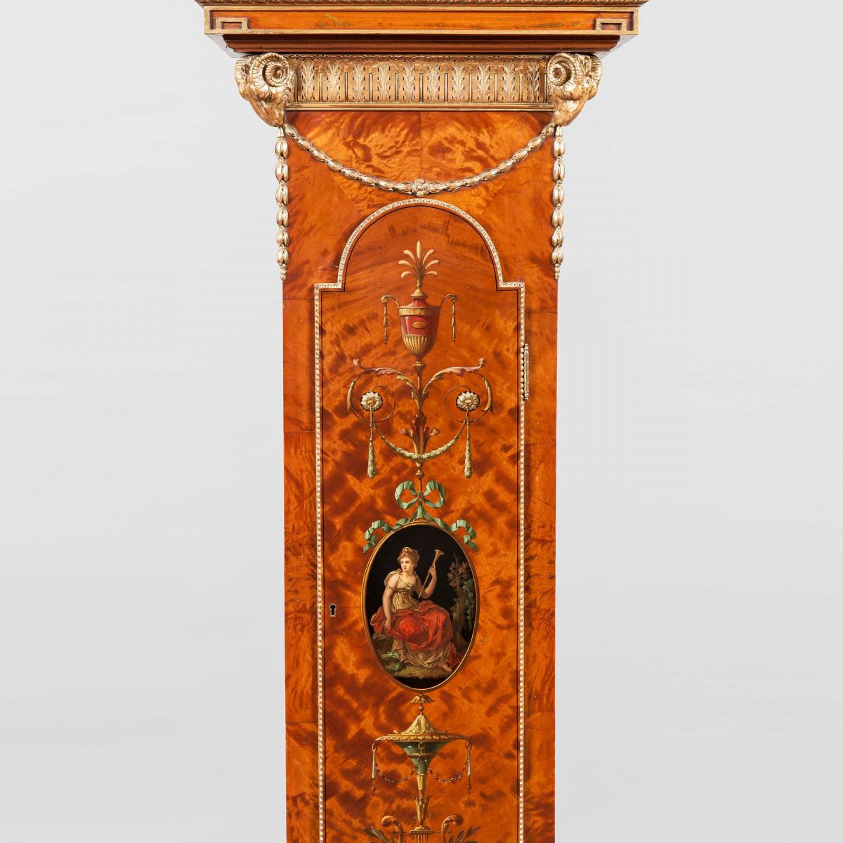 An Antique painted Satinwood Longcase Clock by Maple & Company