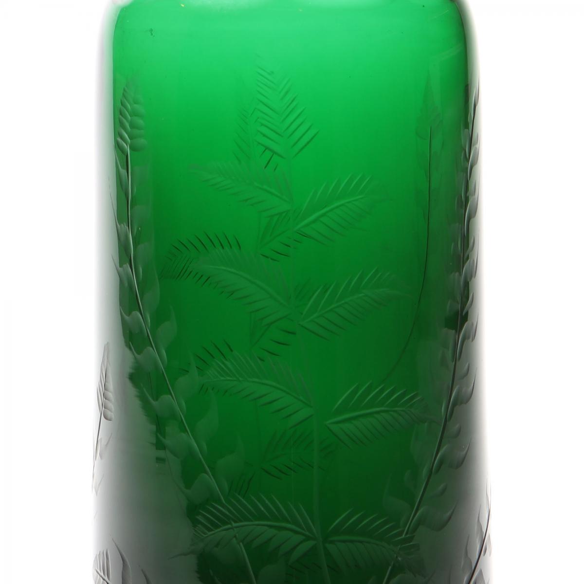 A Victorian green glass decanter