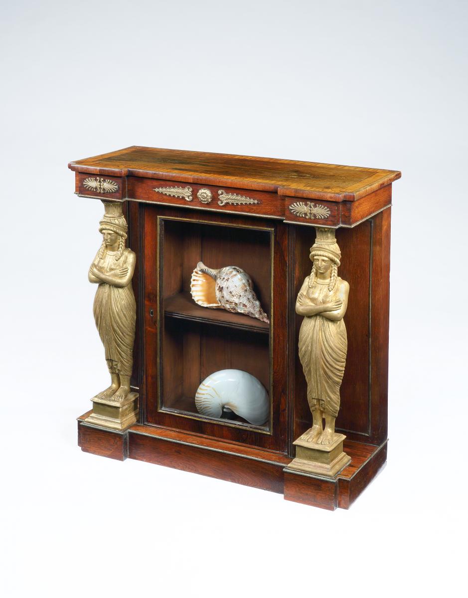 A Rare Regency Period Rosewood Satinwood and Carved Giltwood side Cabinet, English, circa 1810
