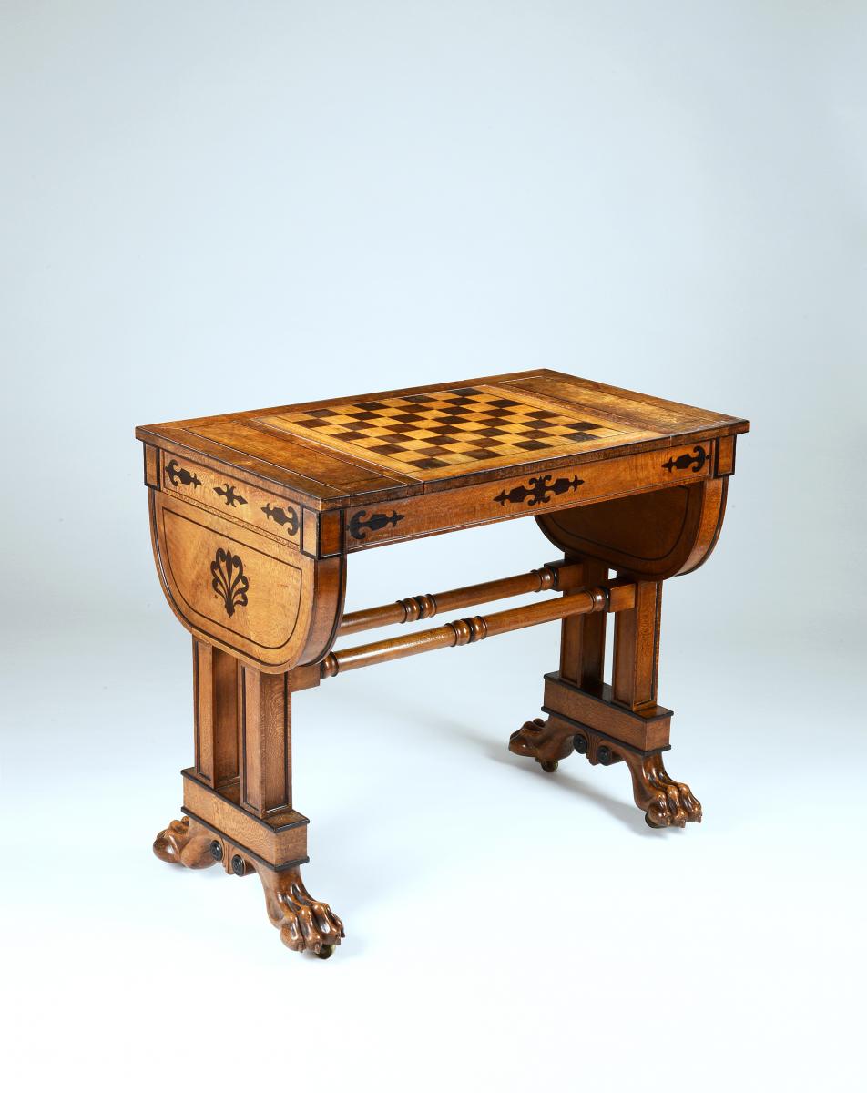 An Exceptional Regency Period Games Table in Solid and Veneered Lacewood Inlaid with Ebony to a Design by George Smith, English circa 1810