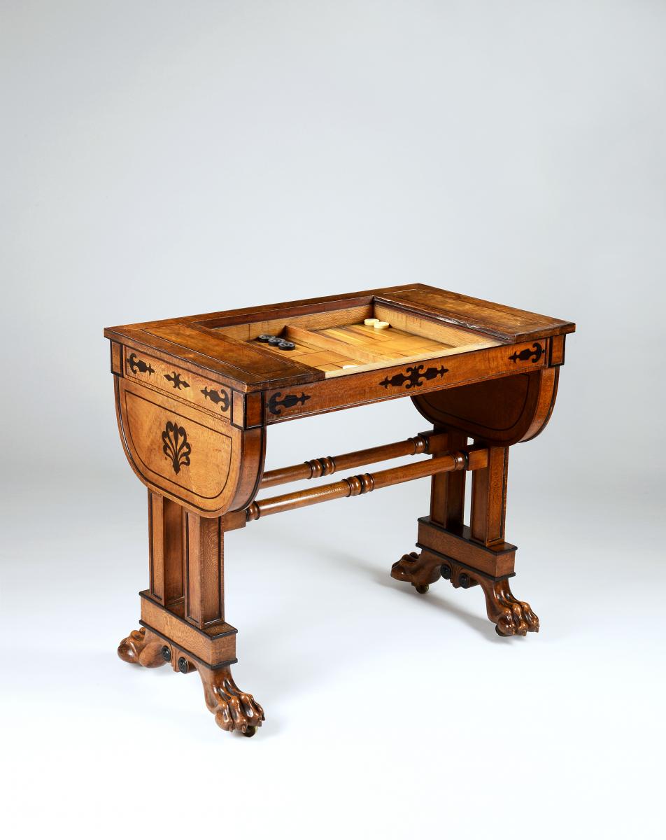 An Exceptional Regency Period Games Table in Solid and Veneered Lacewood Inlaid with Ebony to a Design by George Smith, English circa 1810