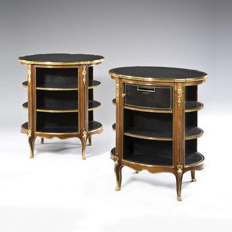 A pair of Napoleon III kingwood freestanding open bookcases