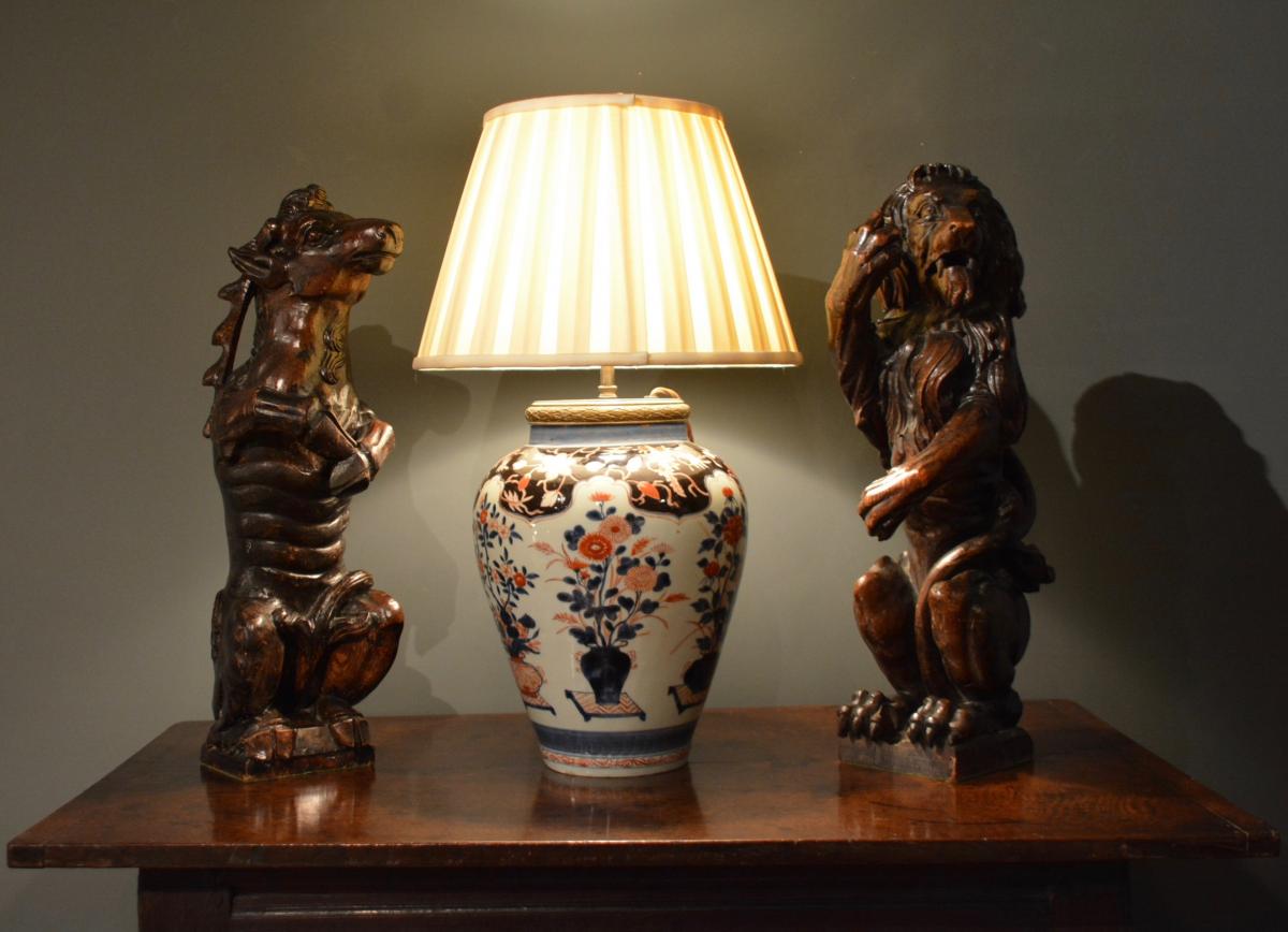 A pair of mid 19th century carved heraldic animals
