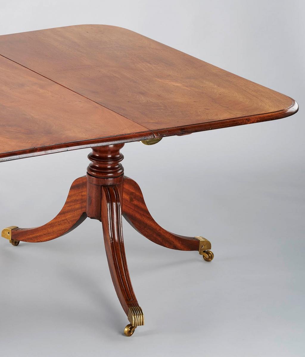 George IV period mahogany twin-pedestal dining table