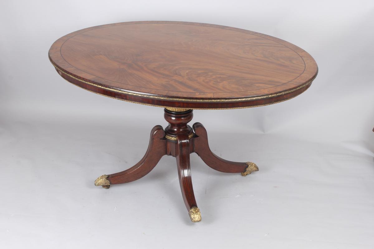 Regency period mahogany oval pedestal breakfast centre table