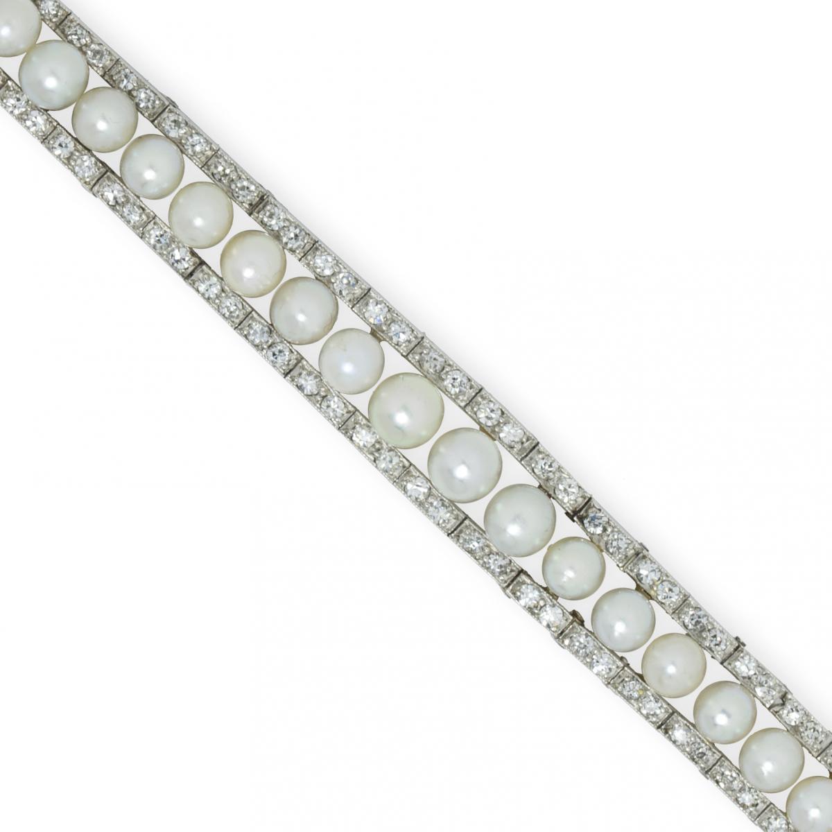 A Fine Edwardian Natural Pearl and Diamond Bracelet, Circa 1910