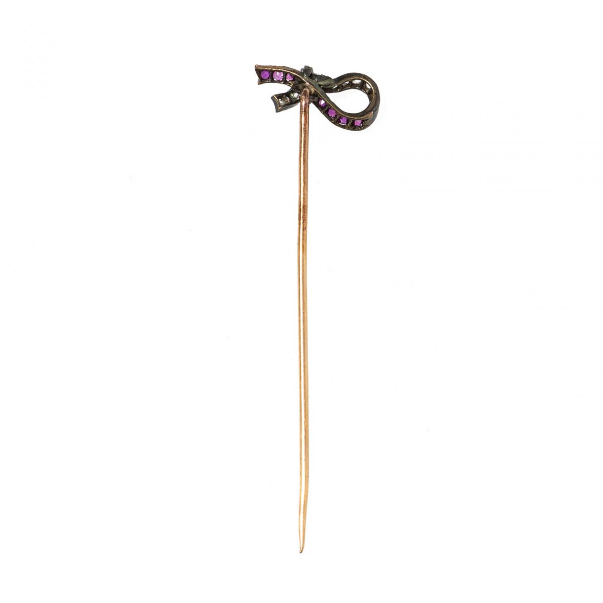 Antique Tie Pin of a Tied Ribbon with Diamonds & Burma Rubies, French circa 1880.