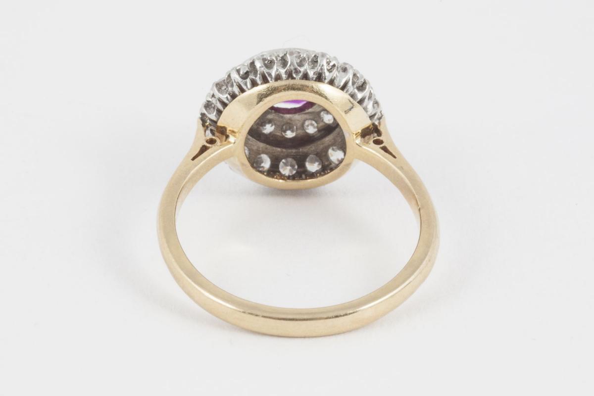 Vintage Burma Ruby & 2 Row Diamond Cluster Ring in 18 Carat Gold, English circa 1950.