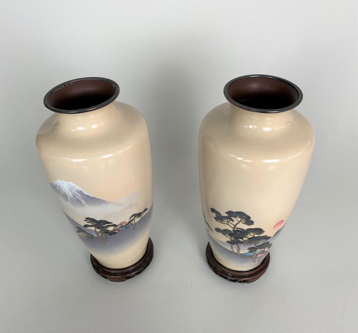 A fine pair of wireless Cloisonne vases depicting Mount Fuji and the rising Sun