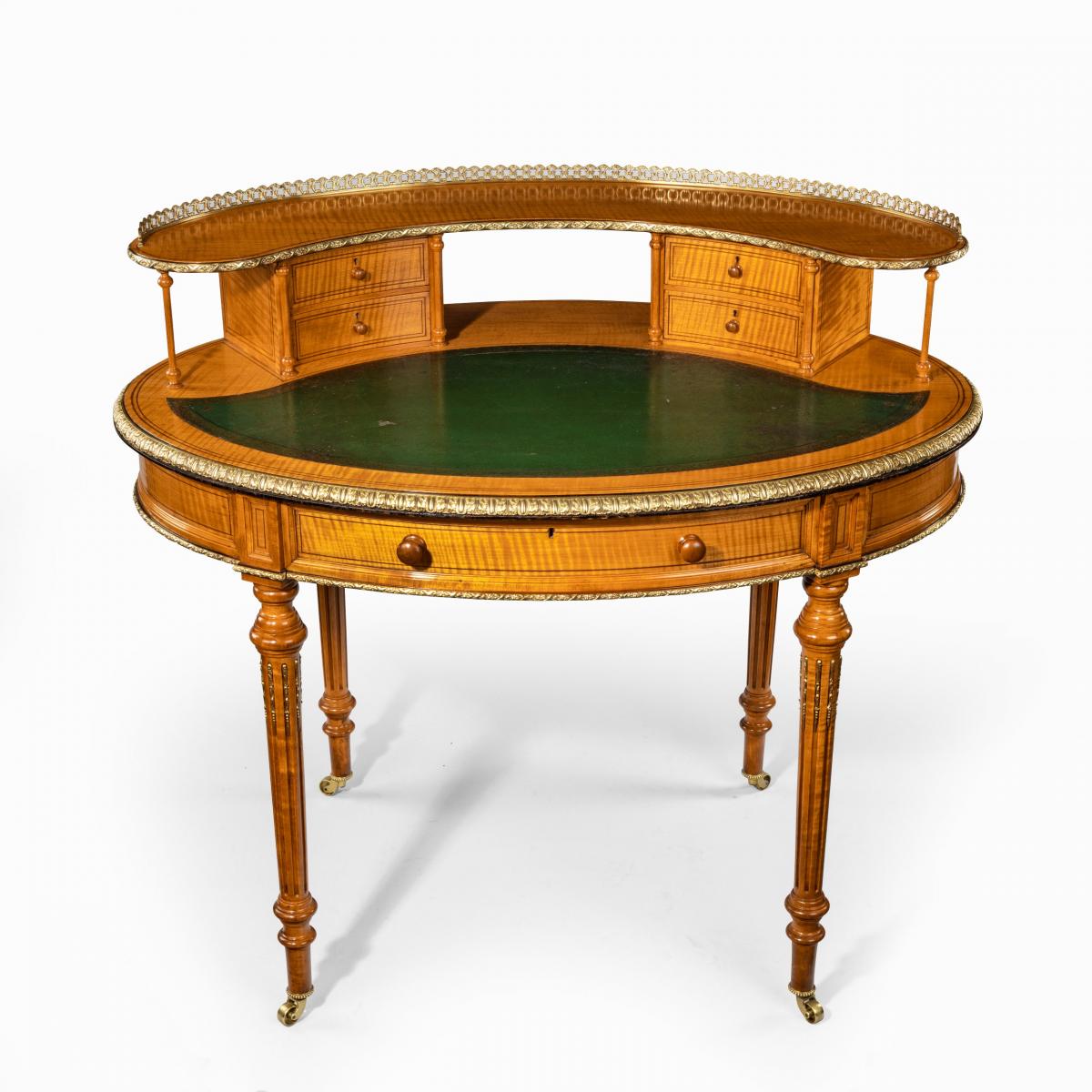 Victorian freestanding oval satinwood desk