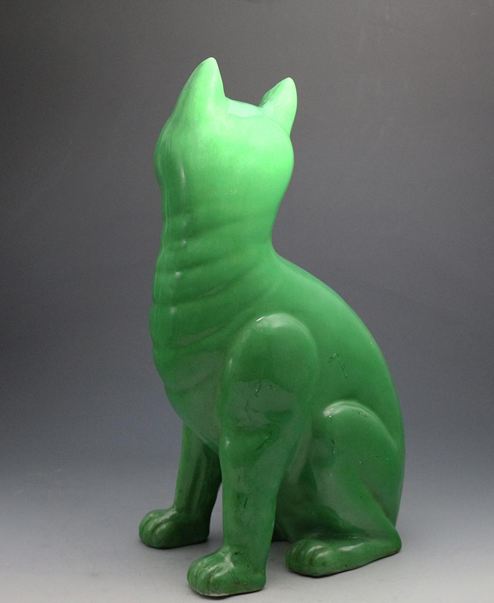 Staffordshire pottery figure of a green comical cat in the Galle manner c1900