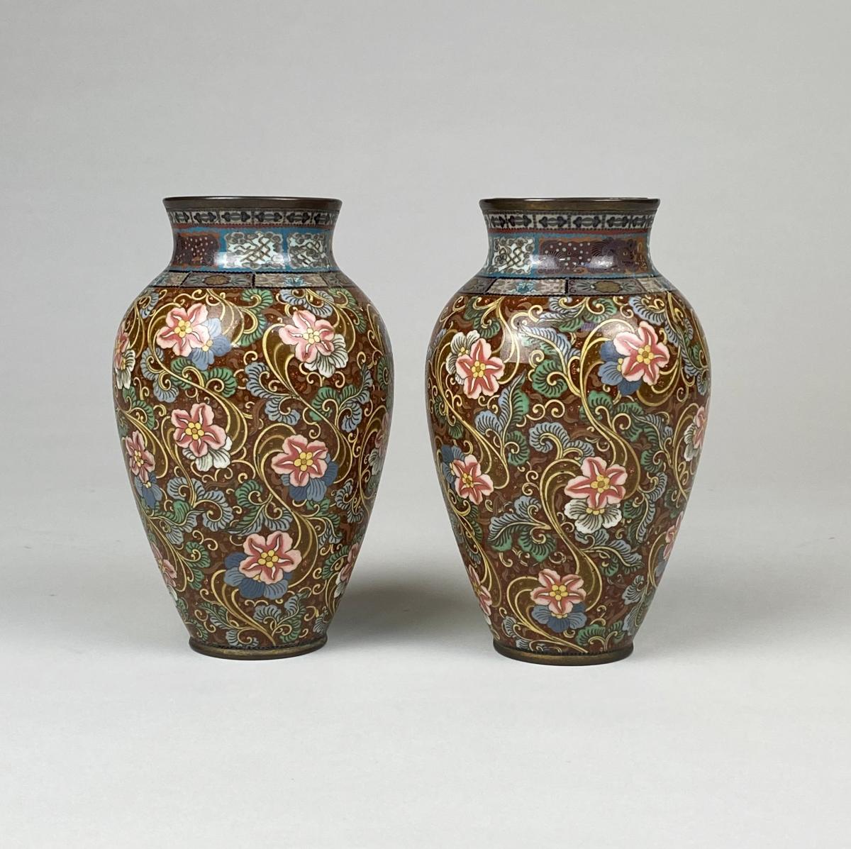 A small, yet dramatic pair of late 19th Century Japanese cloisonne vases