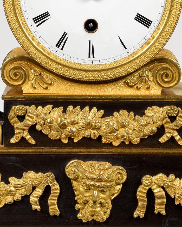 English Regency bronze and ormolu mounted library timepiece - Satyr's head detail