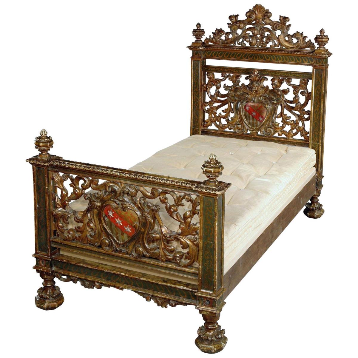 A rare, 19th century, Italian, carved, painted and gilded bed