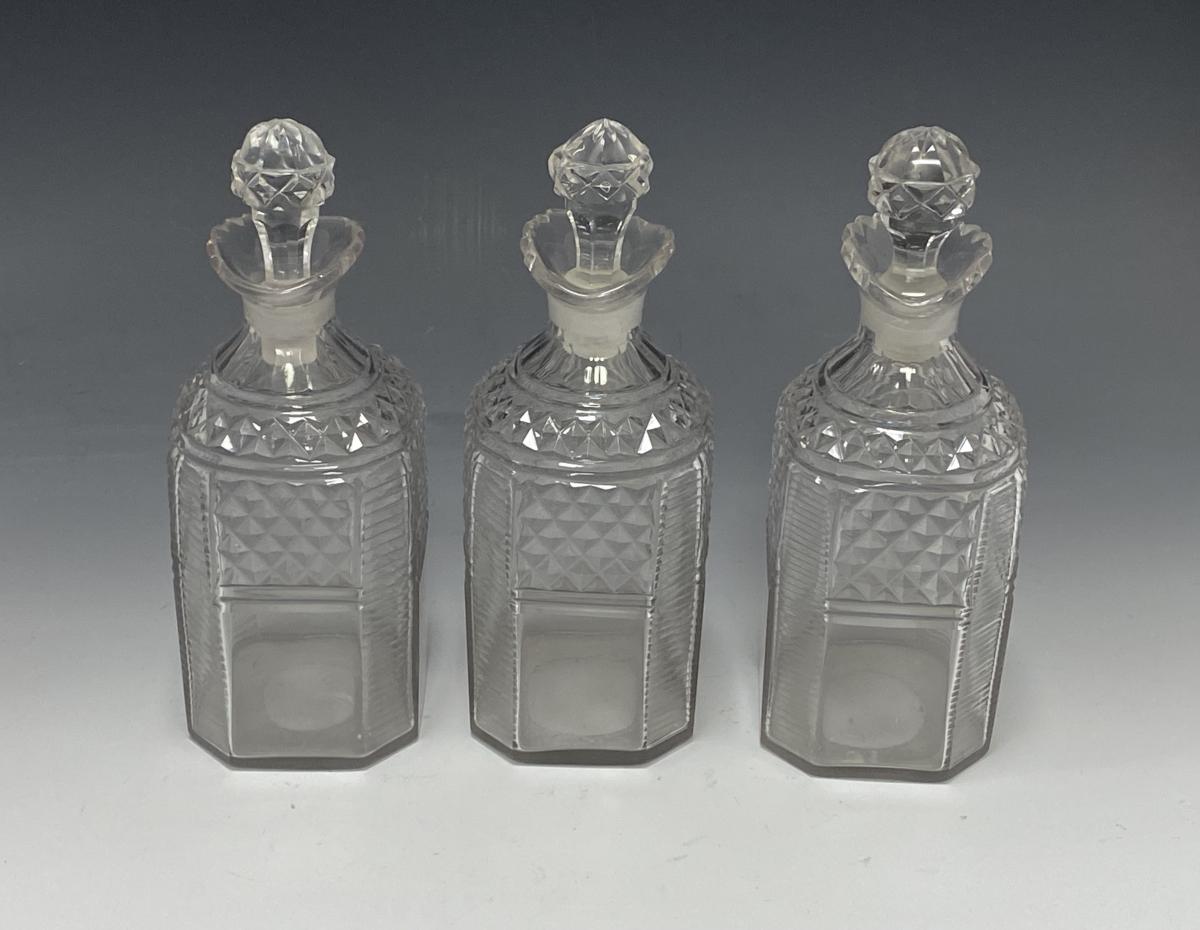 Emes and Barnard decanters in silver frame 