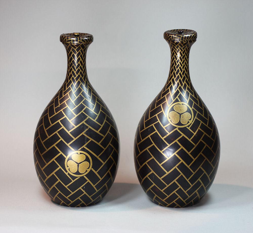 Pair of Japanese lacquer sake-flasks and covers, 19th century