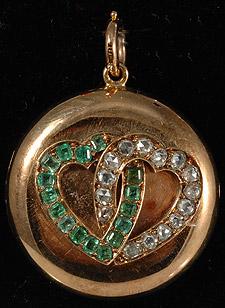 18ct gold locket with emerald and diamond double heart motif circa 1880