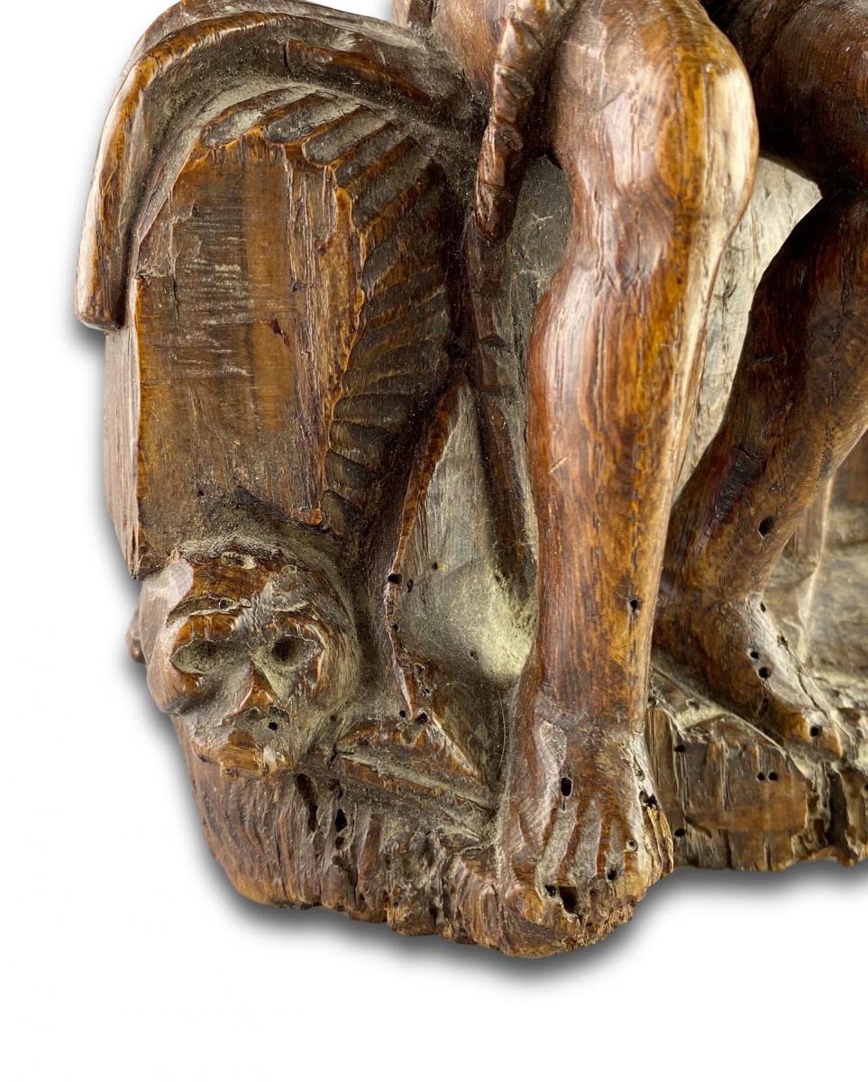 Oak sculpture of Christ on the cold stone. French, early 16th century
