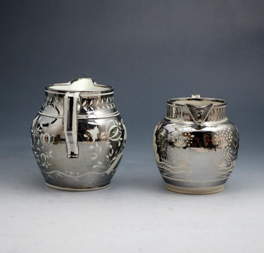 Silver luster pottery pitchers with resist decoration English circa 1820 period