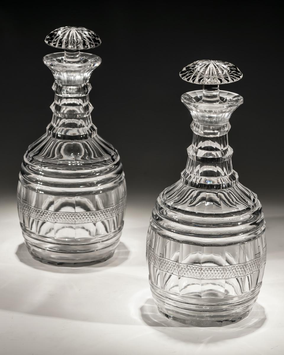 A Pair of Regency Cut Glass Barrel Decanters