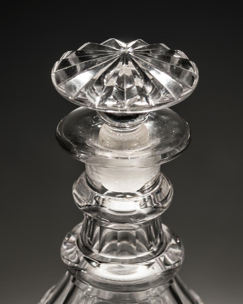 A Pair of Slice Cut Regency Decanters with Diamond Cut Band